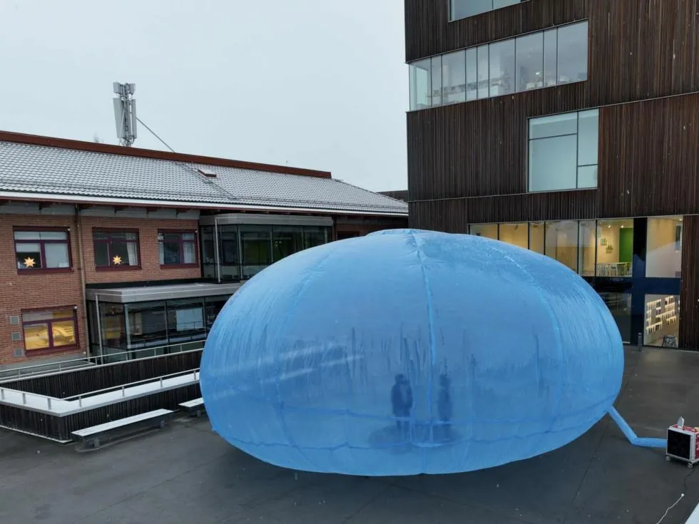 The membrane being inflated next to the Bildmuseet building