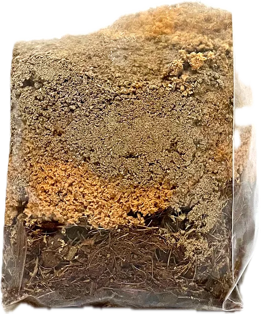 A grow bag of layered substrate, orange and brown